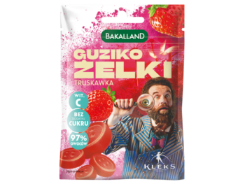 Zdjęcie przedstawia środek spożywczy Bakalland KLEKS Guziko truskawkowe, żelki.
